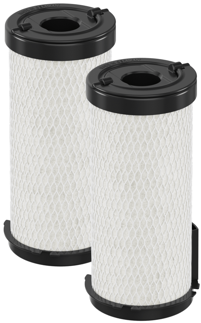 Set out of 2 x Filter BLANCO AQUA AC, two cylindrical water filter cartridges with white mesh filter media and black plastic caps.