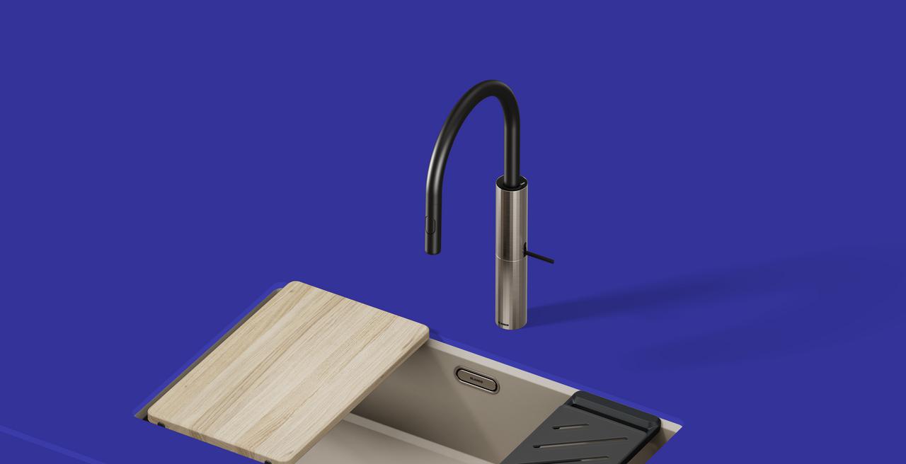 BLANCO LAVIN-C-S kitchen tap in stainless steel with PVD satin platinum finish, high-arc black spout and side lever, shown above a sink. Article number 528165.
