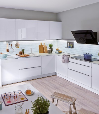 A modern kitchen in white, in the practical L shape