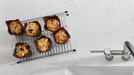 Bake muffins and cookies easily with a white farmhouse kitchen sink