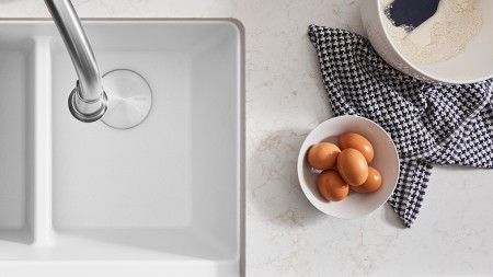 Prepping your ingredients is super easy with a white BLANCO IKON farmhouse kitchen sink