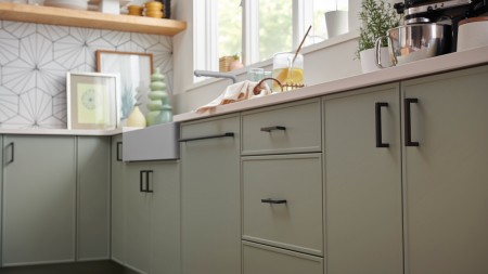 Mid-century modern kitchen cabinets skew simple, with minimal details.
