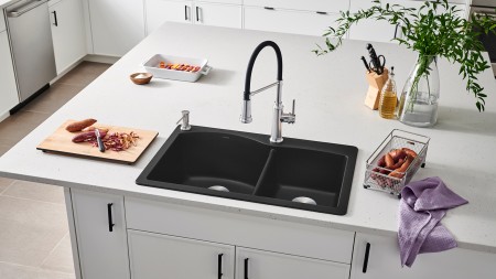 Consult with your installer to ensure that enough space is left behind the sink for the backsplash