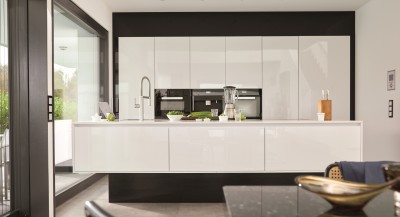a modern stainless steel kitchen with a BLANCO CRONOS sink