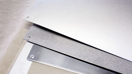 Three stainless steel surfaces in comparison