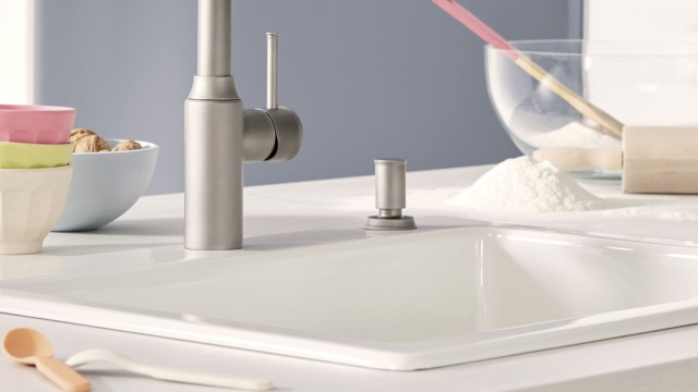 An inset or lay-on sink are inserted into the worktop cut-out and glued in place.