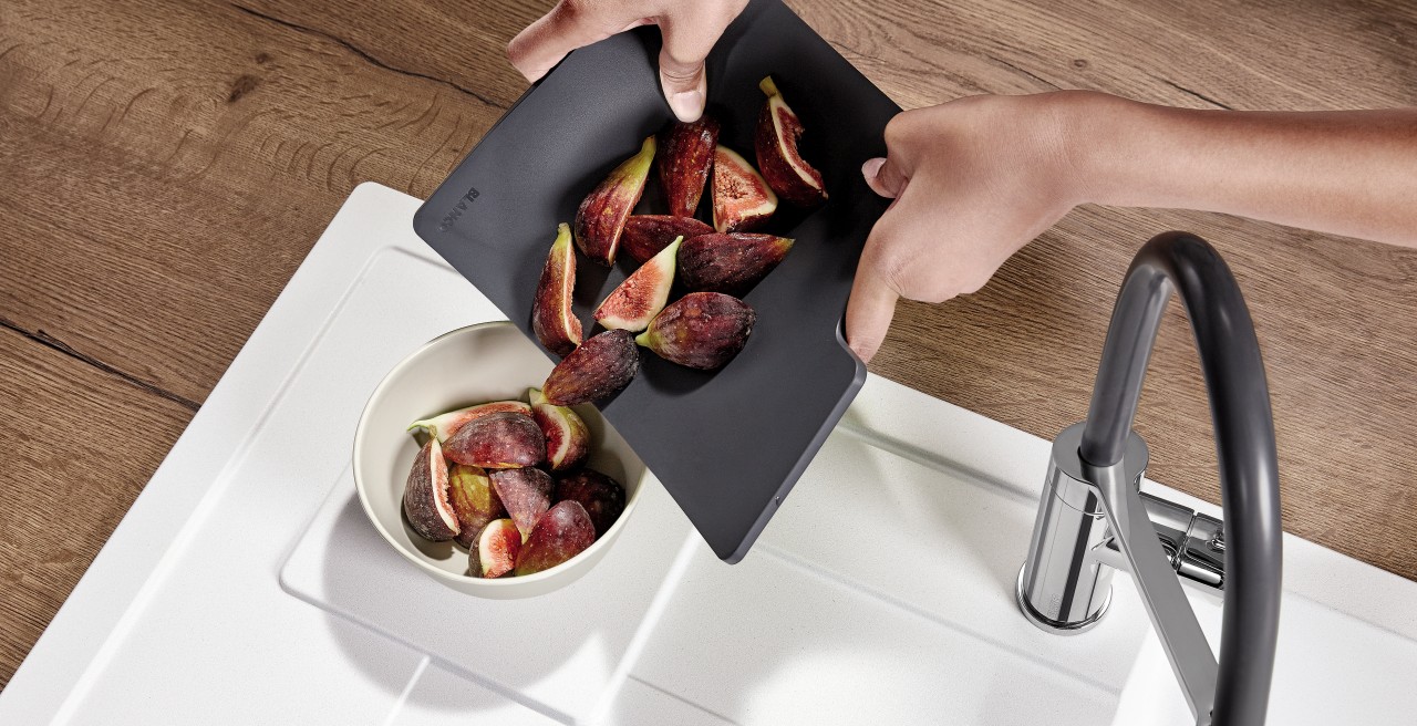 The flexible cutting board makes it easy to transport and arrange fruit