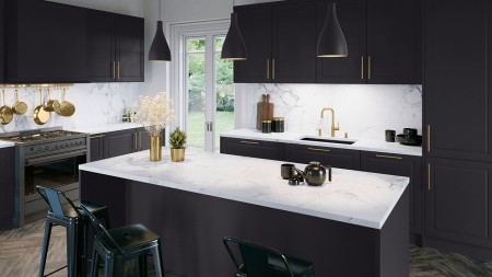 a beautiful black kitchen with silgranit sink